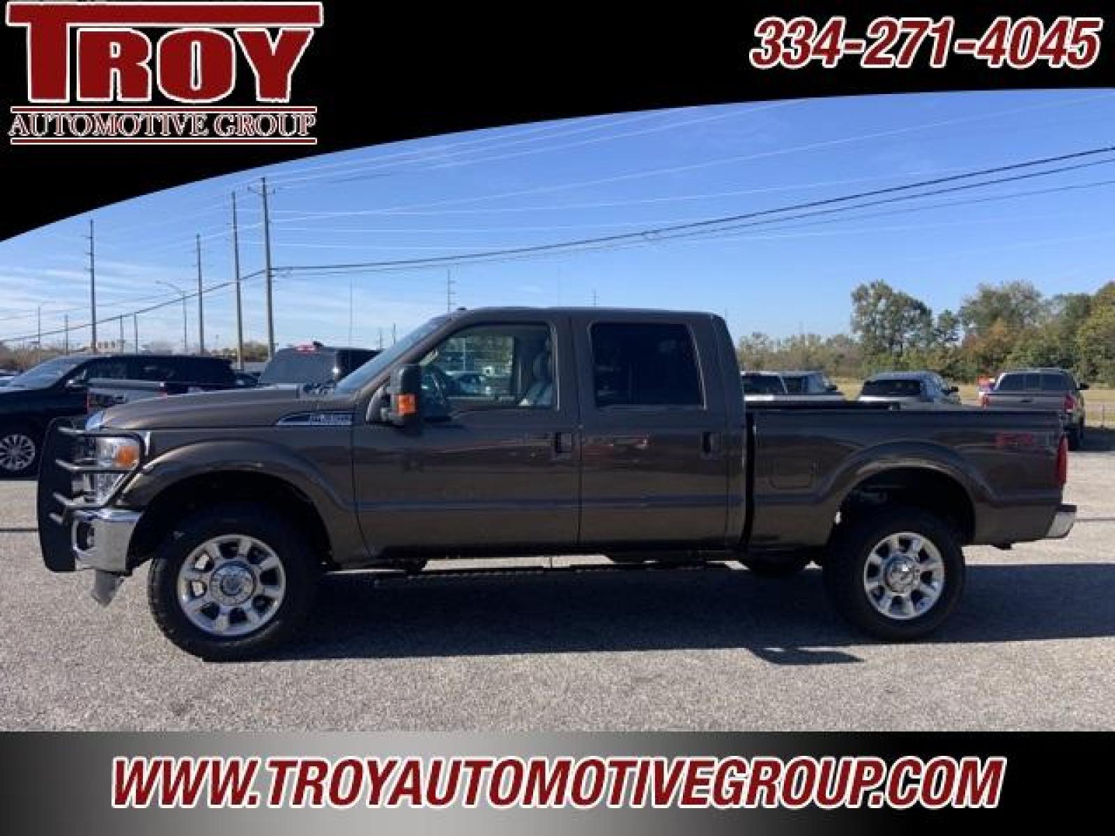 2016 Magnetic Metallic /Pecan Ford F-350SD Lariat (1FT8W3B68GE) with an 6.2L V8 EFI SOHC 16V Flex Fuel engine, Automatic transmission, located at 6812 Atlanta Hwy, Montgomery, AL, 36117, (334) 271-4045, 32.382118, -86.178673 - ABS brakes, Alloy wheels, Compass, Electronic Stability Control, Front dual zone A/C, Heated door mirrors, Illuminated entry, Low tire pressure warning, Remote keyless entry, Traction control.<br><br>Priced below KBB Fair Purchase Price!<br><br>Caribou Metallic 2016 Ford F-350SD Lariat 4WD 6.2L V8 E - Photo #0