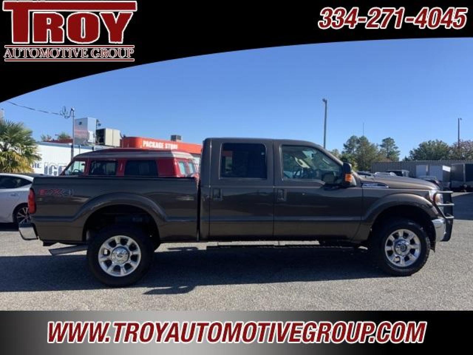 2016 Magnetic Metallic /Pecan Ford F-350SD Lariat (1FT8W3B68GE) with an 6.2L V8 EFI SOHC 16V Flex Fuel engine, Automatic transmission, located at 6812 Atlanta Hwy, Montgomery, AL, 36117, (334) 271-4045, 32.382118, -86.178673 - ABS brakes, Alloy wheels, Compass, Electronic Stability Control, Front dual zone A/C, Heated door mirrors, Illuminated entry, Low tire pressure warning, Remote keyless entry, Traction control.<br><br>Priced below KBB Fair Purchase Price!<br><br>Caribou Metallic 2016 Ford F-350SD Lariat 4WD 6.2L V8 E - Photo #12