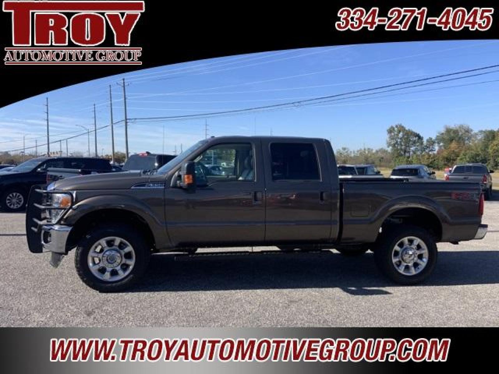 2016 Magnetic Metallic /Pecan Ford F-350SD Lariat (1FT8W3B68GE) with an 6.2L V8 EFI SOHC 16V Flex Fuel engine, Automatic transmission, located at 6812 Atlanta Hwy, Montgomery, AL, 36117, (334) 271-4045, 32.382118, -86.178673 - ABS brakes, Alloy wheels, Compass, Electronic Stability Control, Front dual zone A/C, Heated door mirrors, Illuminated entry, Low tire pressure warning, Remote keyless entry, Traction control.<br><br>Priced below KBB Fair Purchase Price!<br><br>Caribou Metallic 2016 Ford F-350SD Lariat 4WD 6.2L V8 E - Photo #1
