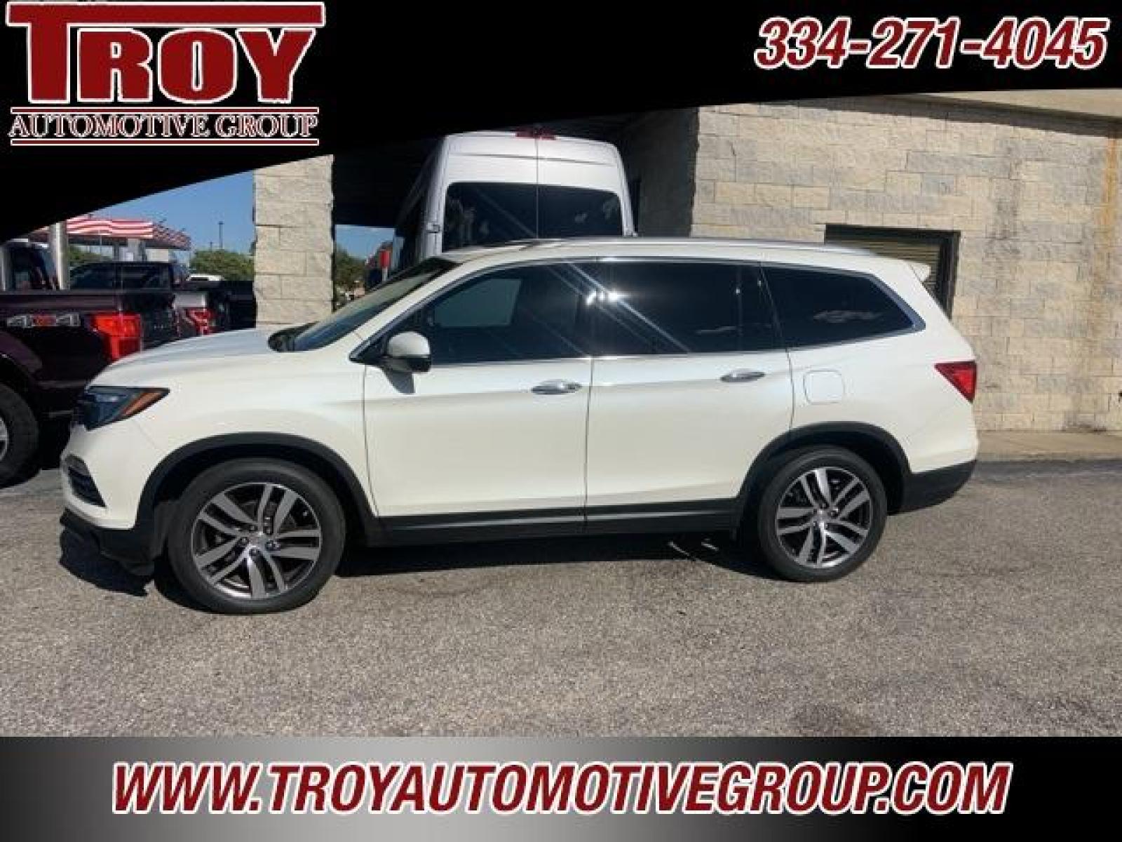 2017 White Diamond Pearl /Beige Honda Pilot Elite (5FNYF6H02HB) with an 3.5L V6 24V SOHC i-VTEC engine, Automatic transmission, located at 6812 Atlanta Hwy, Montgomery, AL, 36117, (334) 271-4045, 32.382118, -86.178673 - White 2017 Honda Pilot Elite AWD 3.5L V6 24V SOHC i-VTEC 9-Speed Automatic<br><br>Financing Available---Top Value for Trades.<br><br>19/26 City/Highway MPG<br><br><br>Awards:<br> * 2017 IIHS Top Safety Pick+ (When equipped with Honda Sensing and specific headlights) * 2017 KBB.com 12 Best Family - Photo #1