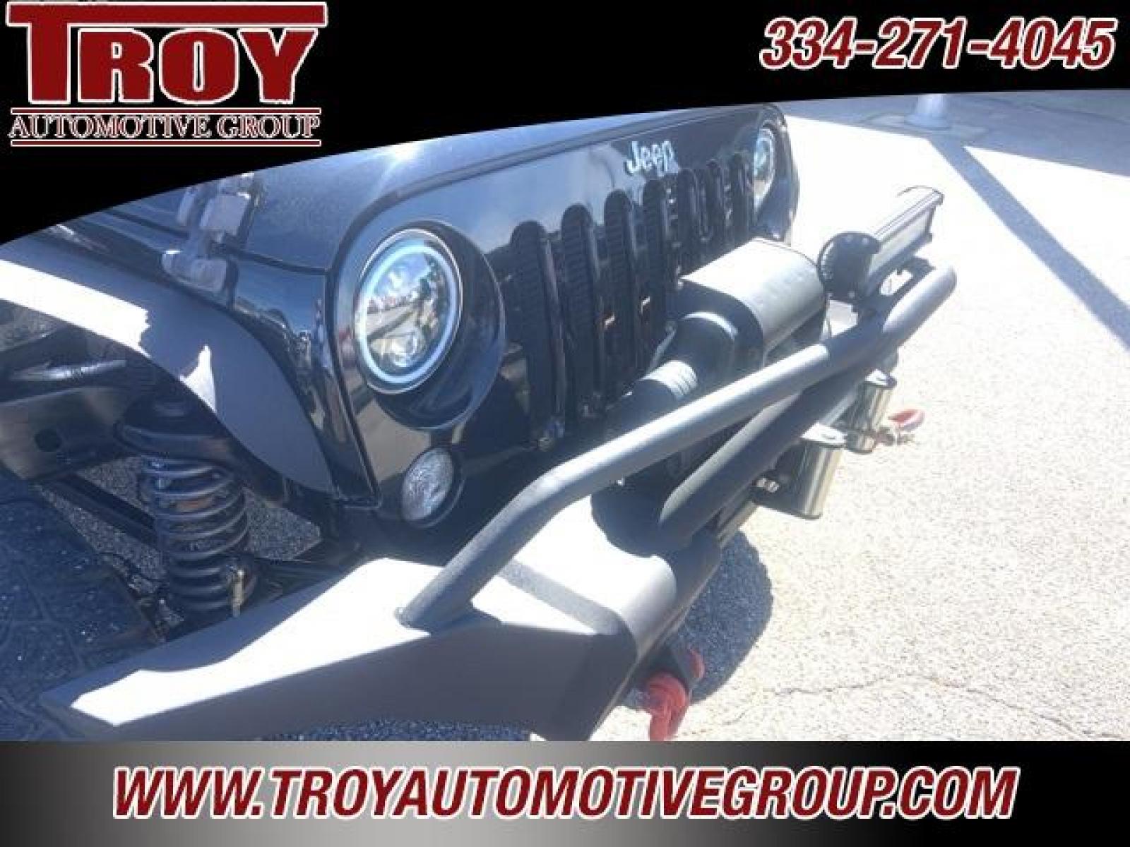 2014 Black Clearcoat /Black Jeep Wrangler Unlimited Sahara (1C4BJWEG4EL) with an 3.6L V6 24V VVT engine, Automatic transmission, located at 6812 Atlanta Hwy, Montgomery, AL, 36117, (334) 271-4045, 32.382118, -86.178673 - Black Clearcoat 2014 Jeep Wrangler Unlimited Sahara 4WD 3.6L V6 24V VVT 5-Speed Automatic<br><br>Financing Available---Top Value for Trades. - Photo #9