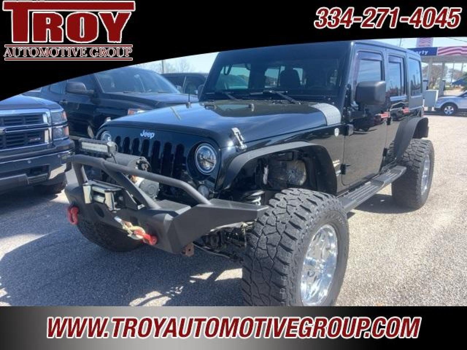 2014 Black Clearcoat /Black Jeep Wrangler Unlimited Sahara (1C4BJWEG4EL) with an 3.6L V6 24V VVT engine, Automatic transmission, located at 6812 Atlanta Hwy, Montgomery, AL, 36117, (334) 271-4045, 32.382118, -86.178673 - Black Clearcoat 2014 Jeep Wrangler Unlimited Sahara 4WD 3.6L V6 24V VVT 5-Speed Automatic<br><br>Financing Available---Top Value for Trades. - Photo #2