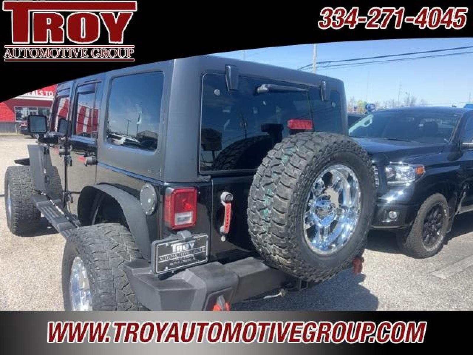 2014 Black Clearcoat /Black Jeep Wrangler Unlimited Sahara (1C4BJWEG4EL) with an 3.6L V6 24V VVT engine, Automatic transmission, located at 6812 Atlanta Hwy, Montgomery, AL, 36117, (334) 271-4045, 32.382118, -86.178673 - Black Clearcoat 2014 Jeep Wrangler Unlimited Sahara 4WD 3.6L V6 24V VVT 5-Speed Automatic<br><br>Financing Available---Top Value for Trades. - Photo #4
