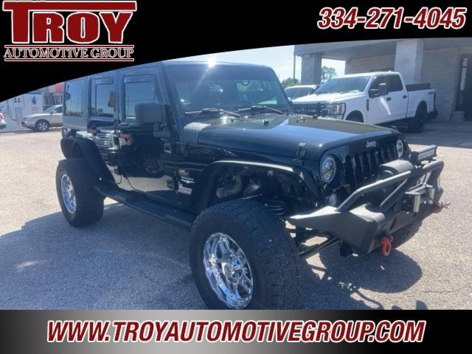 2014 Black Clearcoat /Black Jeep Wrangler Unlimited Sahara (1C4BJWEG4EL) with an 3.6L V6 24V VVT engine, Automatic transmission, located at 6812 Atlanta Hwy, Montgomery, AL, 36117, (334) 271-4045, 32.382118, -86.178673 - Black Clearcoat 2014 Jeep Wrangler Unlimited Sahara 4WD 3.6L V6 24V VVT 5-Speed Automatic<br><br>Financing Available---Top Value for Trades. - Photo #8