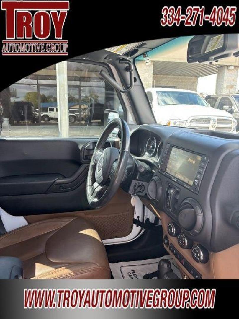 2017 Bright White Clearcoat /Dark Olive/Black Jeep Wrangler Unlimited Rubicon (1C4HJWFG5HL) with an 3.6L V6 24V VVT engine, Automatic transmission, located at 6812 Atlanta Hwy, Montgomery, AL, 36117, (334) 271-4045, 32.382118, -86.178673 - Only 59k!!<br>Saddle Leather Interior!!<br>Heated Seats!!<br>Tow Package!!<br>Alpine Premium Sound!!<br> - Photo#31