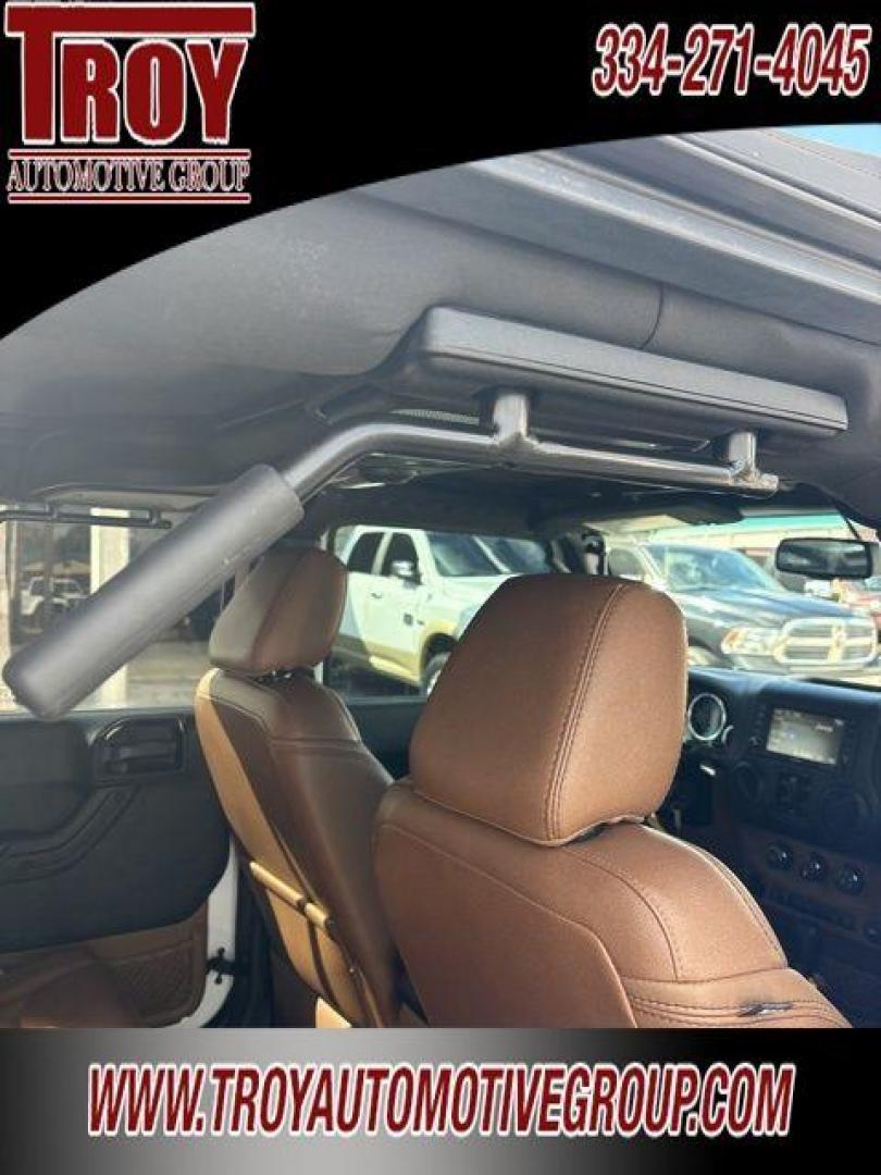 2017 Bright White Clearcoat /Dark Olive/Black Jeep Wrangler Unlimited Rubicon (1C4HJWFG5HL) with an 3.6L V6 24V VVT engine, Automatic transmission, located at 6812 Atlanta Hwy, Montgomery, AL, 36117, (334) 271-4045, 32.382118, -86.178673 - Only 59k!!<br>Saddle Leather Interior!!<br>Heated Seats!!<br>Tow Package!!<br>Alpine Premium Sound!!<br> - Photo#33