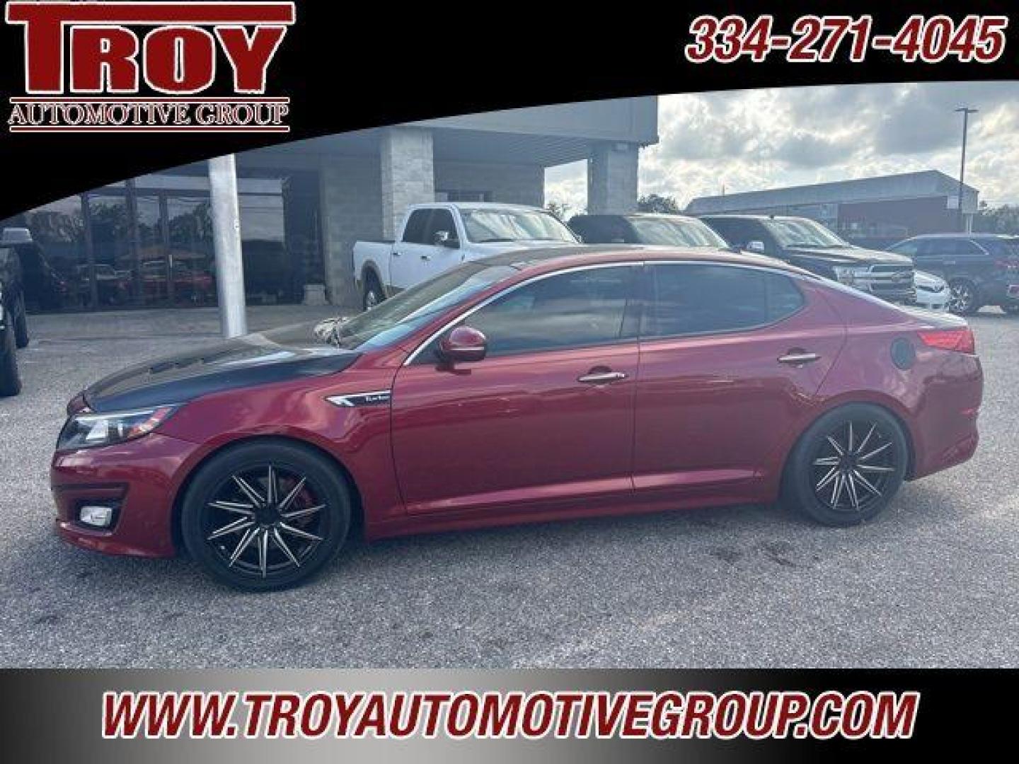 2015 Red Metallic /Black Kia Optima SX (5XXGR4A62FG) with an 2.0L I4 DGI DOHC Turbocharged engine, Automatic transmission, located at 6812 Atlanta Hwy, Montgomery, AL, 36117, (334) 271-4045, 32.382118, -86.178673 - Recent Arrival!<br>Custom Exhaust!!<br>Cold Air Intake!!<br>Carbon Fiber Hood!!<br>Sunroof!! Leather!! Navigation!!<br><br><br>Remington Red Metallic 2015 Kia Optima SXL FWD Turbo 2.0L I4 DGI DOHC Turbocharged 6-Speed Automatic with Sportmatic<br><br>Financing Available---Top Value for Trades.<br><b - Photo#1