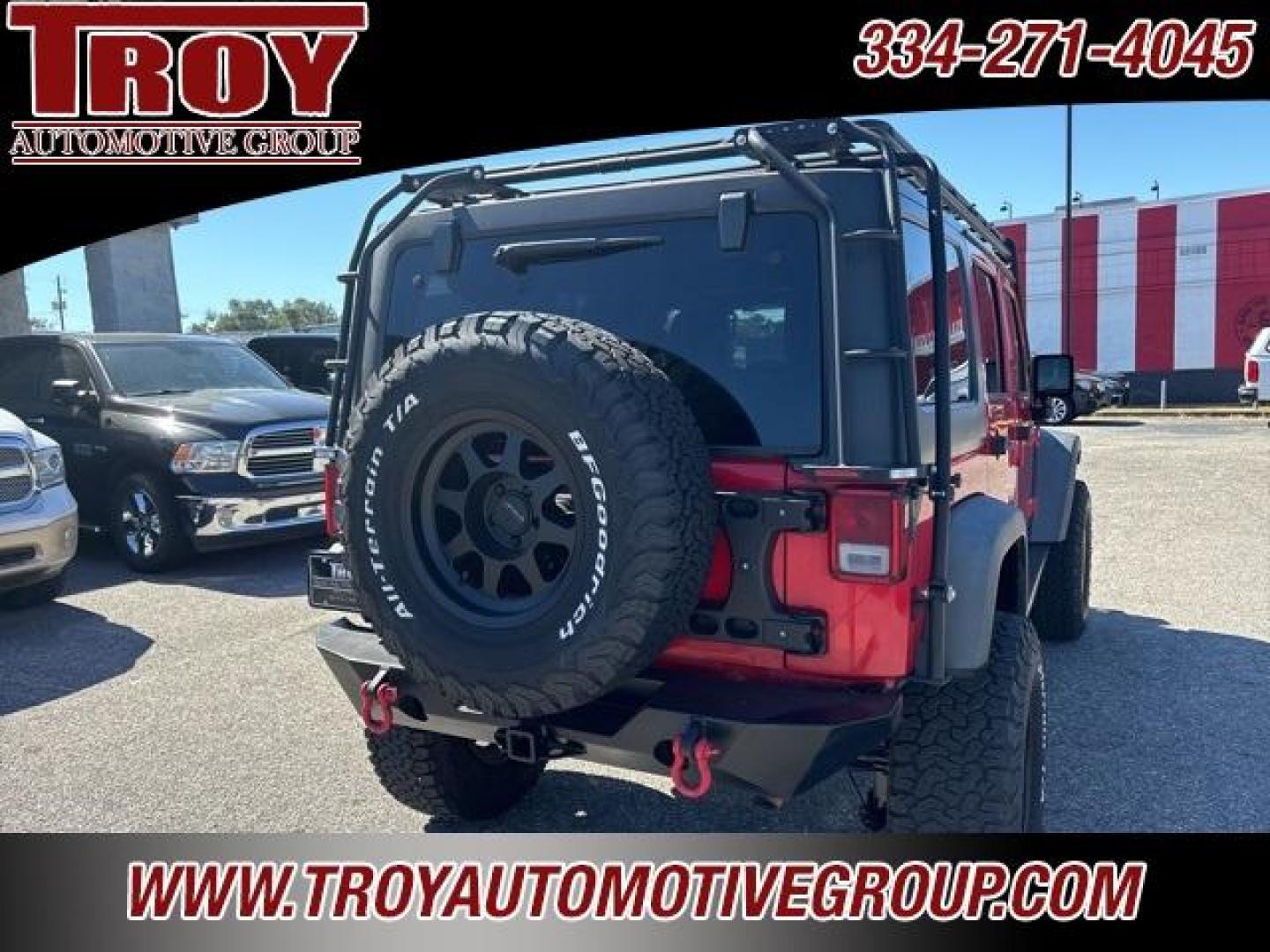 2015 Firecracker Red Clear Coat /Black Jeep Wrangler Unlimited Sport (1C4BJWDG8FL) with an 3.6L V6 24V VVT engine, Automatic transmission, located at 6812 Atlanta Hwy, Montgomery, AL, 36117, (334) 271-4045, 32.382118, -86.178673 - Photo#10