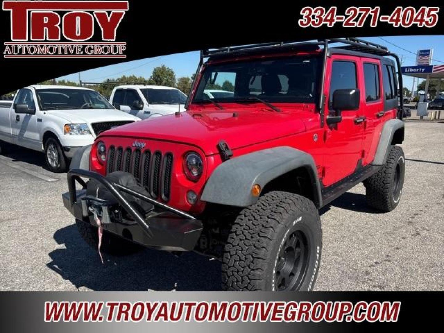 2015 Firecracker Red Clear Coat /Black Jeep Wrangler Unlimited Sport (1C4BJWDG8FL) with an 3.6L V6 24V VVT engine, Automatic transmission, located at 6812 Atlanta Hwy, Montgomery, AL, 36117, (334) 271-4045, 32.382118, -86.178673 - Photo#3