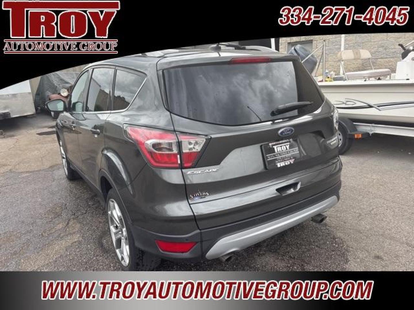2017 Magnetic /Medium Light Stone Ford Escape Titanium (1FMCU0JD9HU) with an 1.5L EcoBoost engine, Automatic transmission, located at 6812 Atlanta Hwy, Montgomery, AL, 36117, (334) 271-4045, 32.382118, -86.178673 - Photo#10