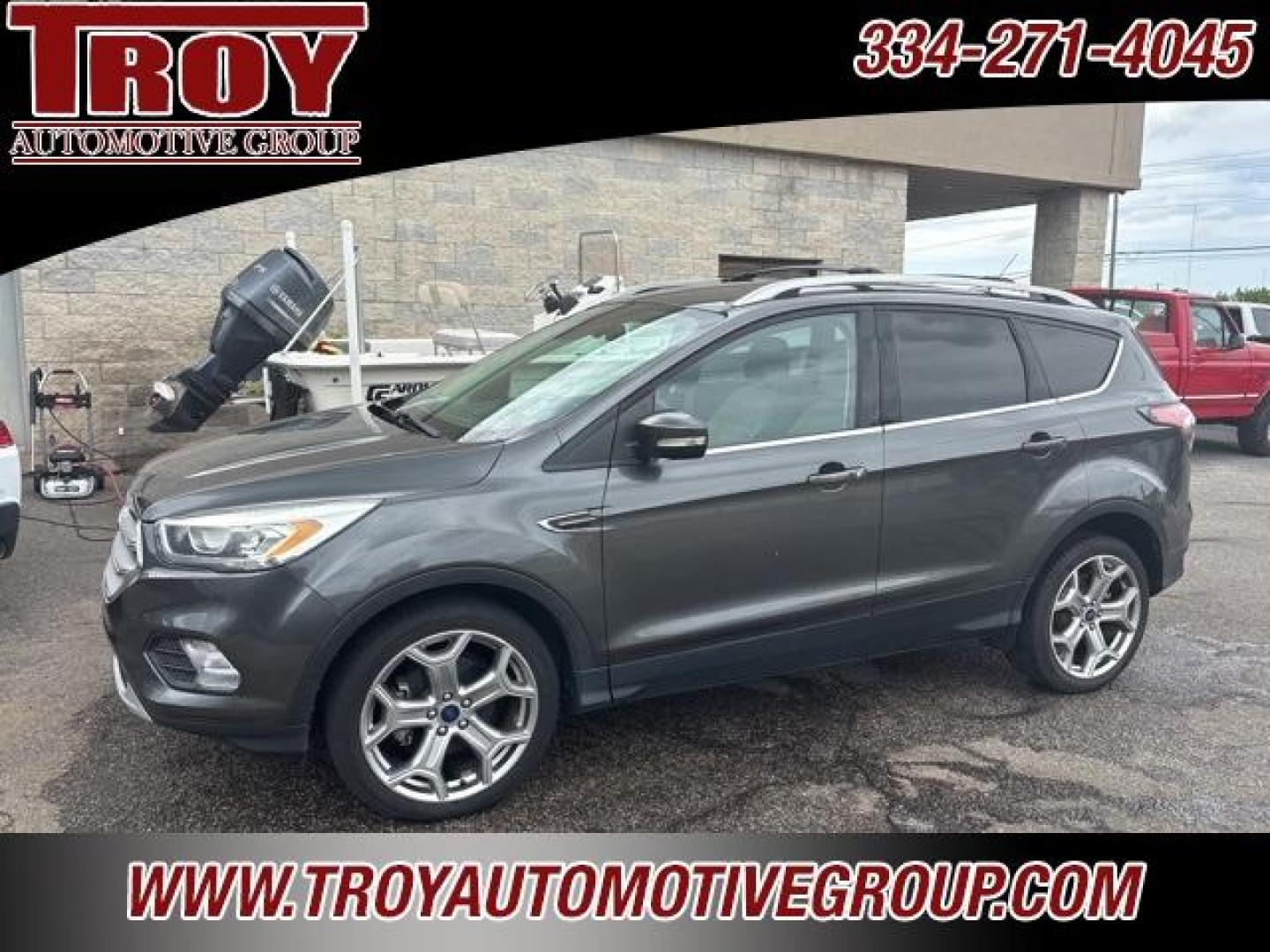 2017 Magnetic /Medium Light Stone Ford Escape Titanium (1FMCU0JD9HU) with an 1.5L EcoBoost engine, Automatic transmission, located at 6812 Atlanta Hwy, Montgomery, AL, 36117, (334) 271-4045, 32.382118, -86.178673 - Photo#1