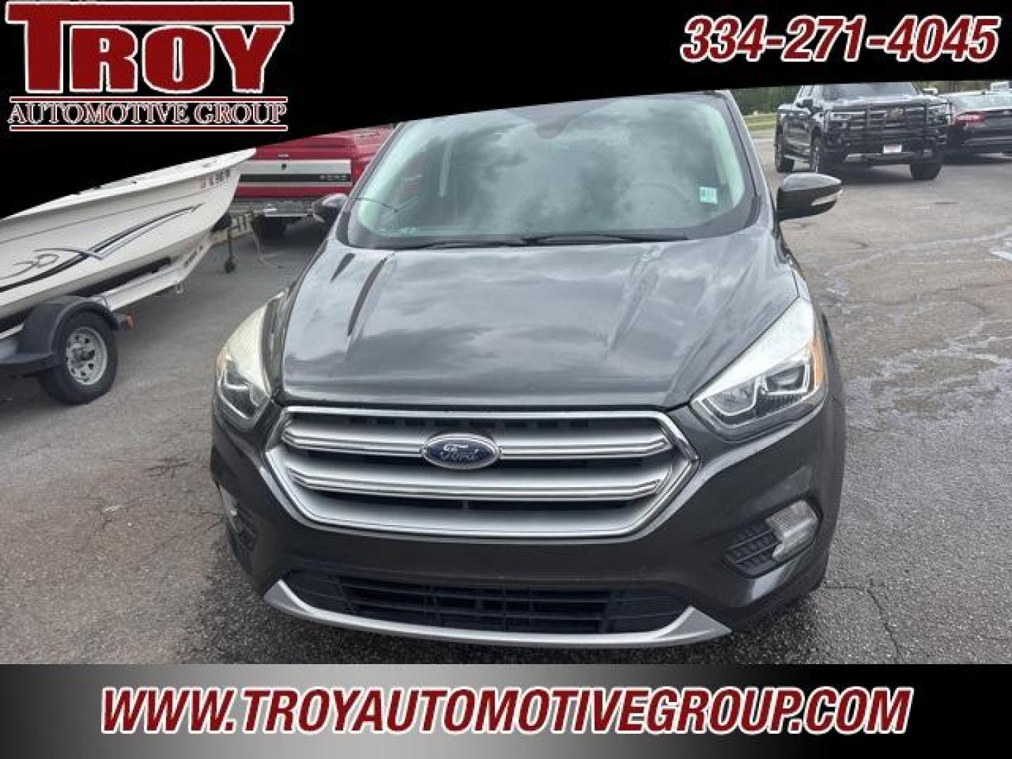 2017 Magnetic /Medium Light Stone Ford Escape Titanium (1FMCU0JD9HU) with an 1.5L EcoBoost engine, Automatic transmission, located at 6812 Atlanta Hwy, Montgomery, AL, 36117, (334) 271-4045, 32.382118, -86.178673 - Photo#4