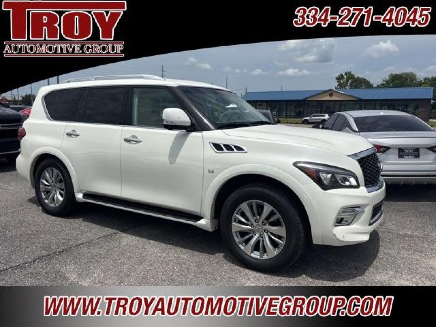 2016 Majestic White /Wheat INFINITI QX80 Base (JN8AZ2NFXG9) with an 5.6L V8 engine, Automatic transmission, located at 6812 Atlanta Hwy, Montgomery, AL, 36117, (334) 271-4045, 32.382118, -86.178673 - Photo#1