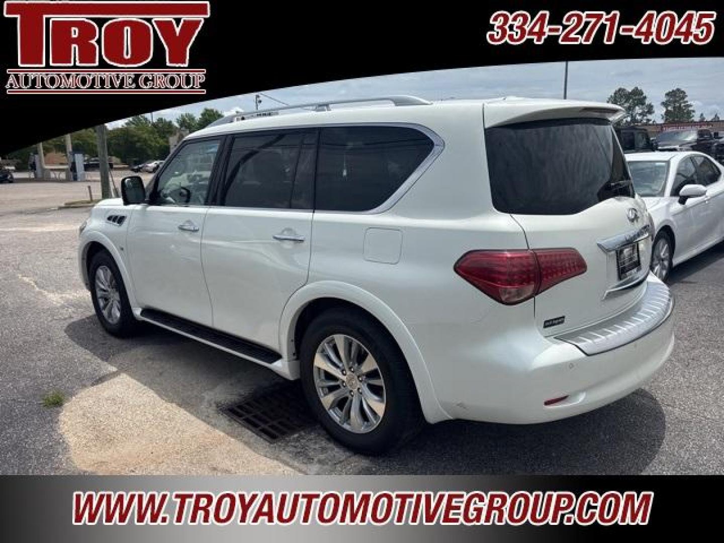 2016 Majestic White /Wheat INFINITI QX80 Base (JN8AZ2NFXG9) with an 5.6L V8 engine, Automatic transmission, located at 6812 Atlanta Hwy, Montgomery, AL, 36117, (334) 271-4045, 32.382118, -86.178673 - Photo#6