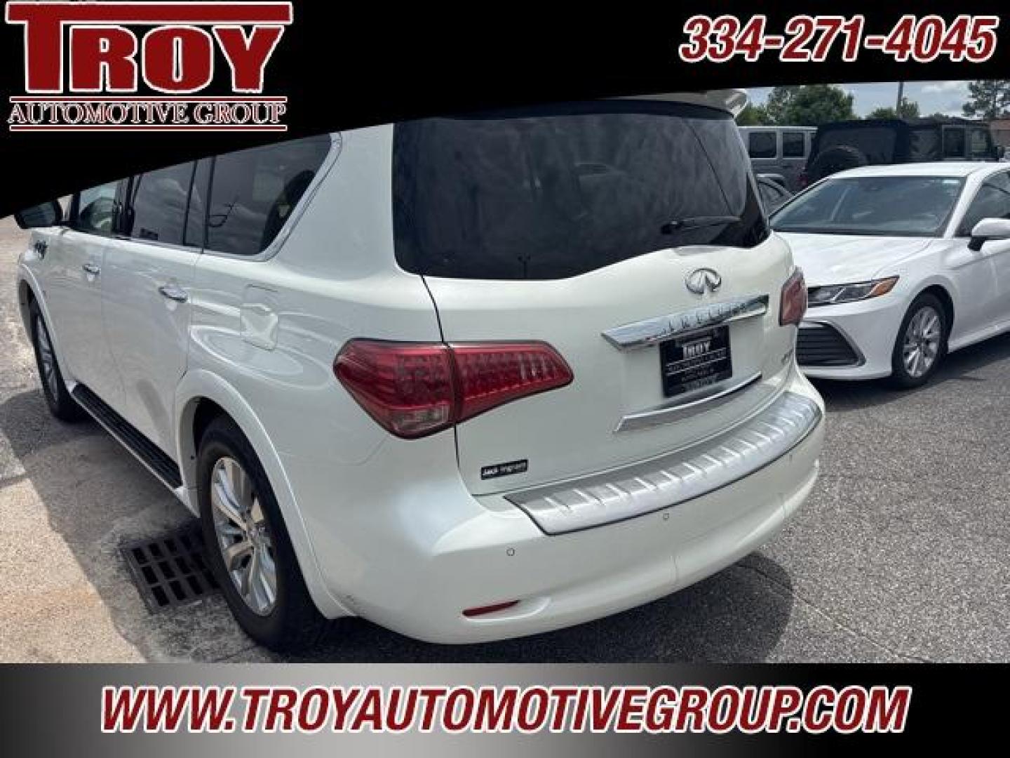 2016 Majestic White /Wheat INFINITI QX80 Base (JN8AZ2NFXG9) with an 5.6L V8 engine, Automatic transmission, located at 6812 Atlanta Hwy, Montgomery, AL, 36117, (334) 271-4045, 32.382118, -86.178673 - Photo#7