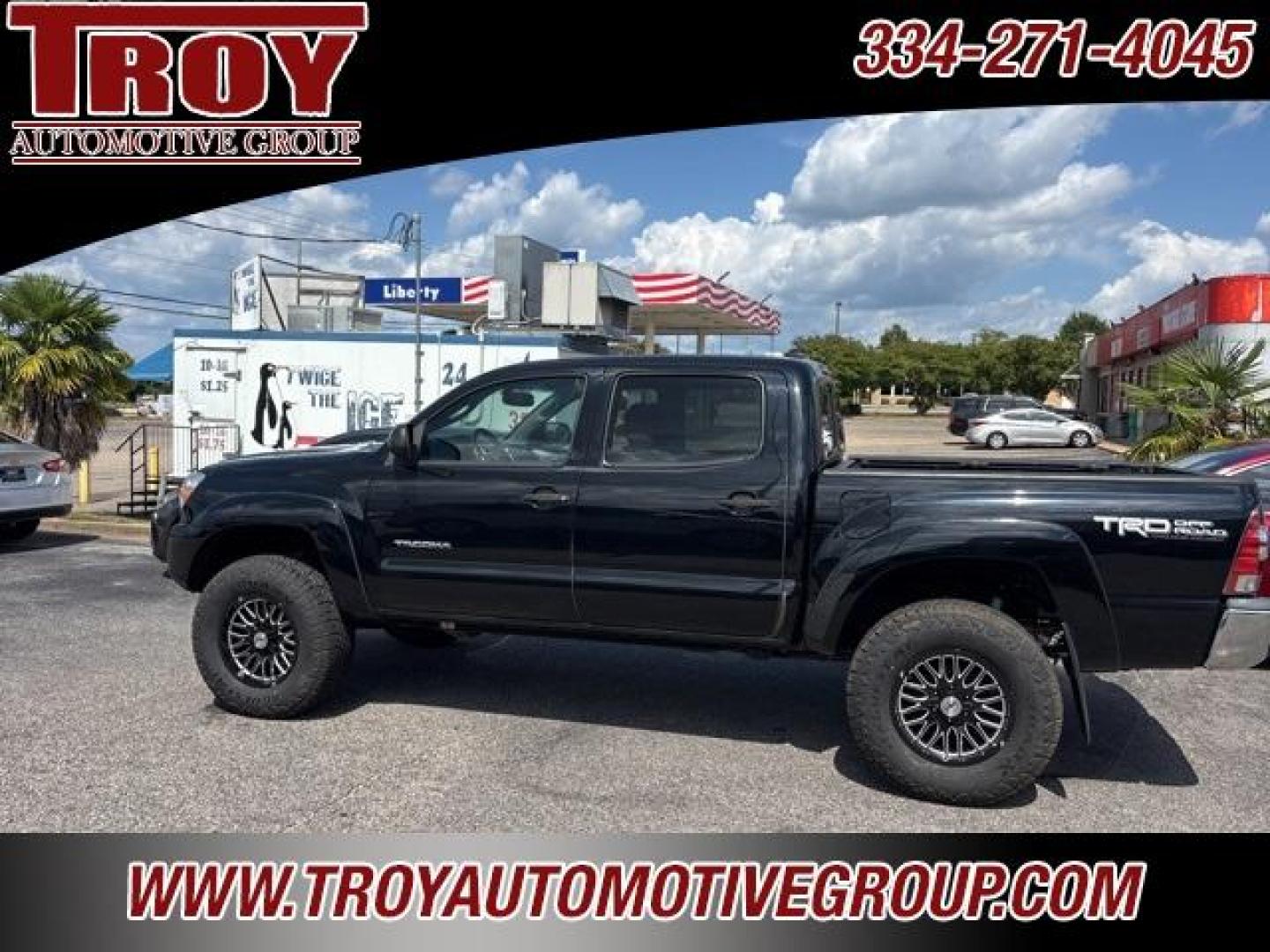 2012 Black /Sand Beige Toyota Tacoma Base (3TMLU4EN2CM) with an 4.0L V6 EFI DOHC 24V engine, Automatic transmission, located at 6812 Atlanta Hwy, Montgomery, AL, 36117, (334) 271-4045, 32.382118, -86.178673 - Black 2012 Toyota Tacoma 4WD V6 4.0L V6 EFI DOHC 24V 5-Speed Automatic with Overdrive<br><br>Financing Available---Top Value for Trades.<br><br>Odometer is 82675 miles below market average!<br><br><br>Awards:<br> * 2012 KBB.com Best Resale Value Awards * 2012 KBB.com 10 Best Used Trucks Under $20 - Photo#1