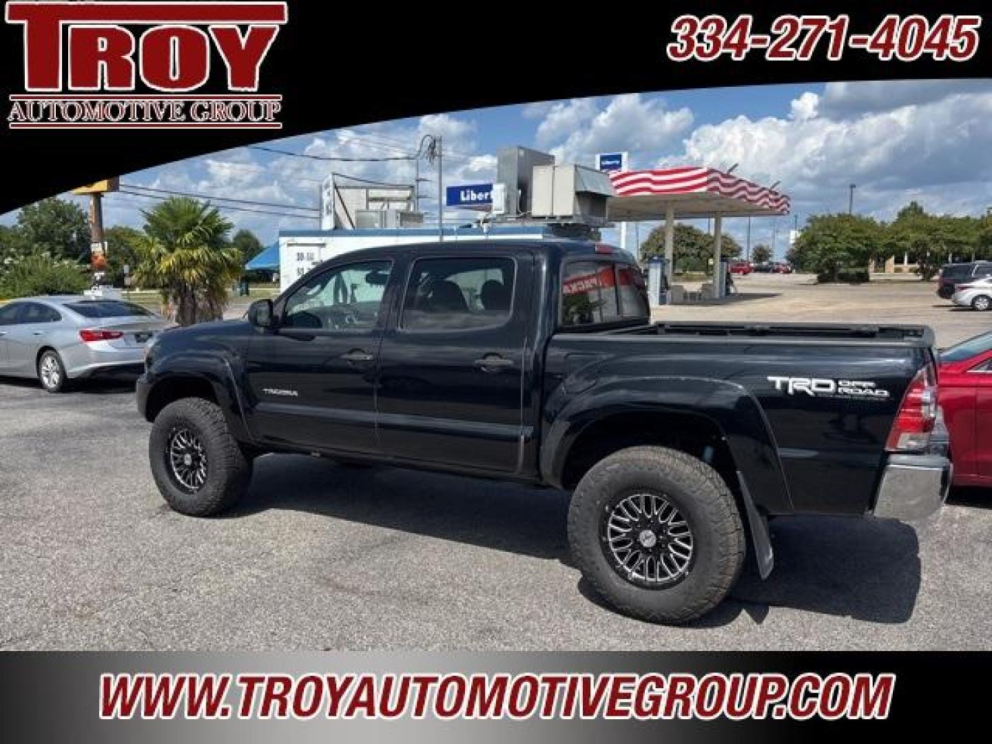 2012 Black /Sand Beige Toyota Tacoma Base (3TMLU4EN2CM) with an 4.0L V6 EFI DOHC 24V engine, Automatic transmission, located at 6812 Atlanta Hwy, Montgomery, AL, 36117, (334) 271-4045, 32.382118, -86.178673 - Black 2012 Toyota Tacoma 4WD V6 4.0L V6 EFI DOHC 24V 5-Speed Automatic with Overdrive<br><br>Financing Available---Top Value for Trades.<br><br>Odometer is 82675 miles below market average!<br><br><br>Awards:<br> * 2012 KBB.com Best Resale Value Awards * 2012 KBB.com 10 Best Used Trucks Under $20 - Photo#2