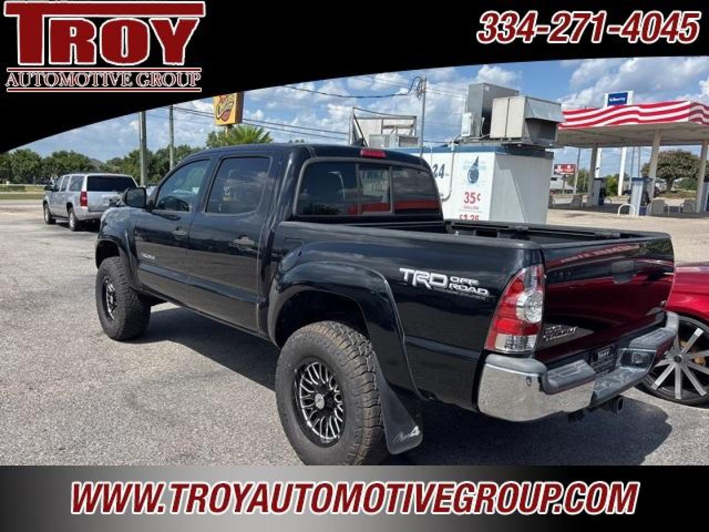 2012 Black /Sand Beige Toyota Tacoma Base (3TMLU4EN2CM) with an 4.0L V6 EFI DOHC 24V engine, Automatic transmission, located at 6812 Atlanta Hwy, Montgomery, AL, 36117, (334) 271-4045, 32.382118, -86.178673 - Black 2012 Toyota Tacoma 4WD V6 4.0L V6 EFI DOHC 24V 5-Speed Automatic with Overdrive<br><br>Financing Available---Top Value for Trades.<br><br>Odometer is 82675 miles below market average!<br><br><br>Awards:<br> * 2012 KBB.com Best Resale Value Awards * 2012 KBB.com 10 Best Used Trucks Under $20 - Photo#3