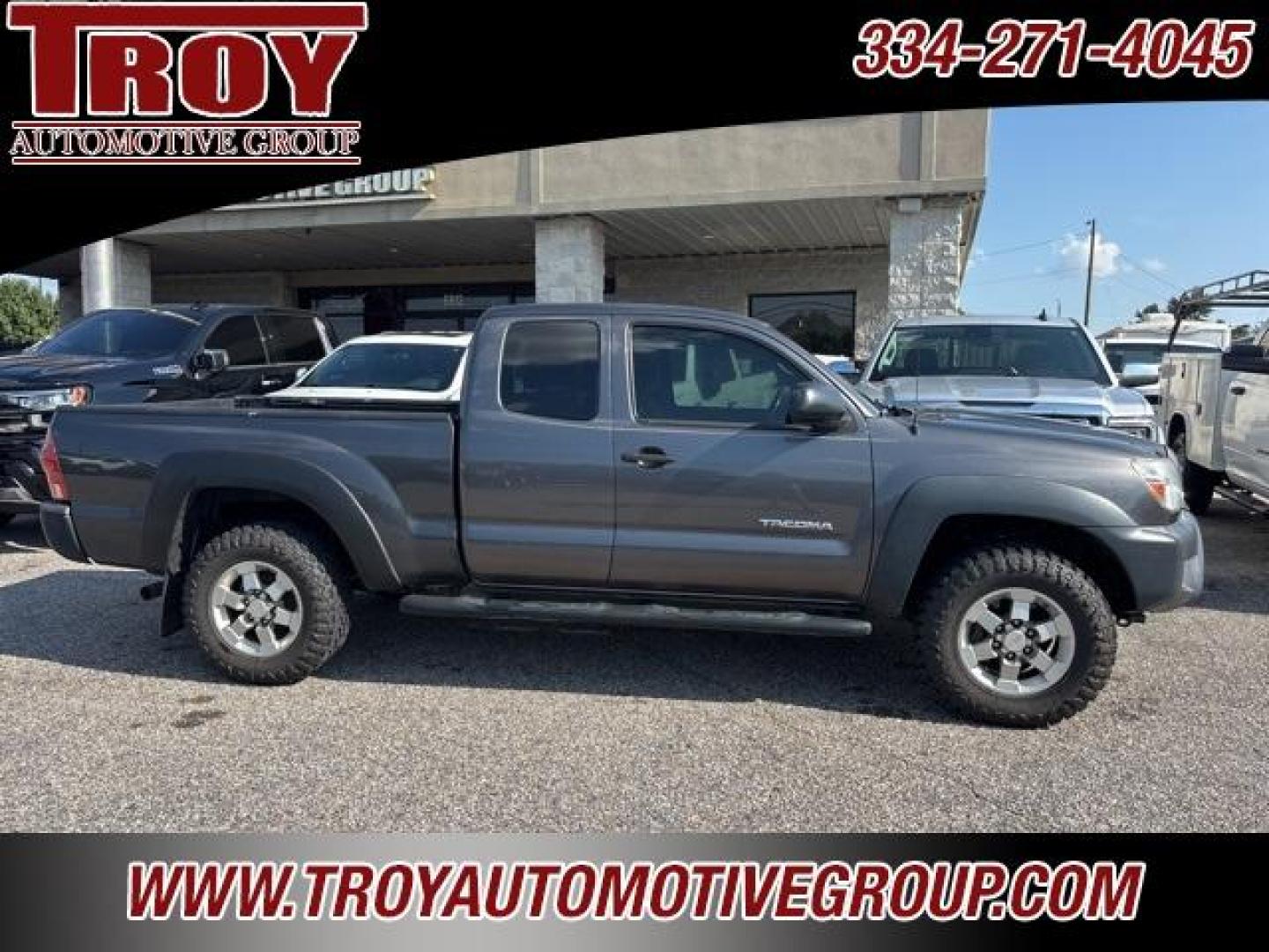 2015 Magnetic Gray Metallic /Graphite Toyota Tacoma Base (5TFUX4EN4FX) with an 2.7L I4 DOHC 16V engine, Manual transmission, located at 6812 Atlanta Hwy, Montgomery, AL, 36117, (334) 271-4045, 32.382118, -86.178673 - TRD Alloy Wheels!!<br>M/T Tires!!<br>All Power Options!!<br>5-Speed Manual !!<br>4WD!!<br>Tow Package!!<br>Step Bars!! - Photo#0