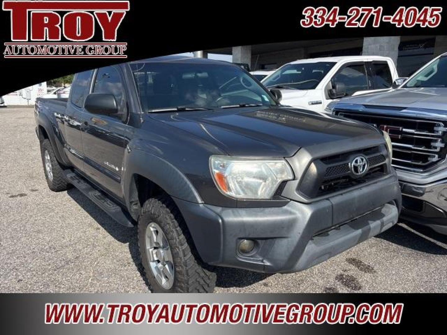 2015 Magnetic Gray Metallic /Graphite Toyota Tacoma Base (5TFUX4EN4FX) with an 2.7L I4 DOHC 16V engine, Manual transmission, located at 6812 Atlanta Hwy, Montgomery, AL, 36117, (334) 271-4045, 32.382118, -86.178673 - TRD Alloy Wheels!!<br>M/T Tires!!<br>All Power Options!!<br>5-Speed Manual !!<br>4WD!!<br>Tow Package!!<br>Step Bars!! - Photo#4