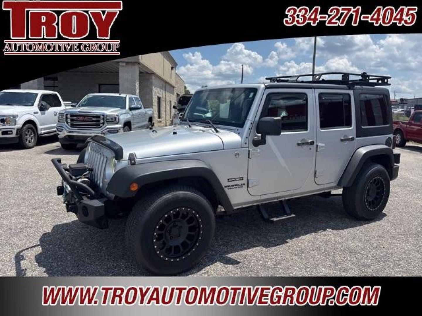 2012 Bright Silver Metallic Clearcoat /Black Interior Jeep Wrangler Unlimited Sport (1C4BJWDG9CL) with an 3.6L V6 24V VVT engine, Automatic transmission, located at 6812 Atlanta Hwy, Montgomery, AL, 36117, (334) 271-4045, 32.382118, -86.178673 - Winch!!<br>Tow Package!!<br>2-Master Remote Keys!!<br>Full Size Matching Spare!!<br>All Power Options!! - Photo#0