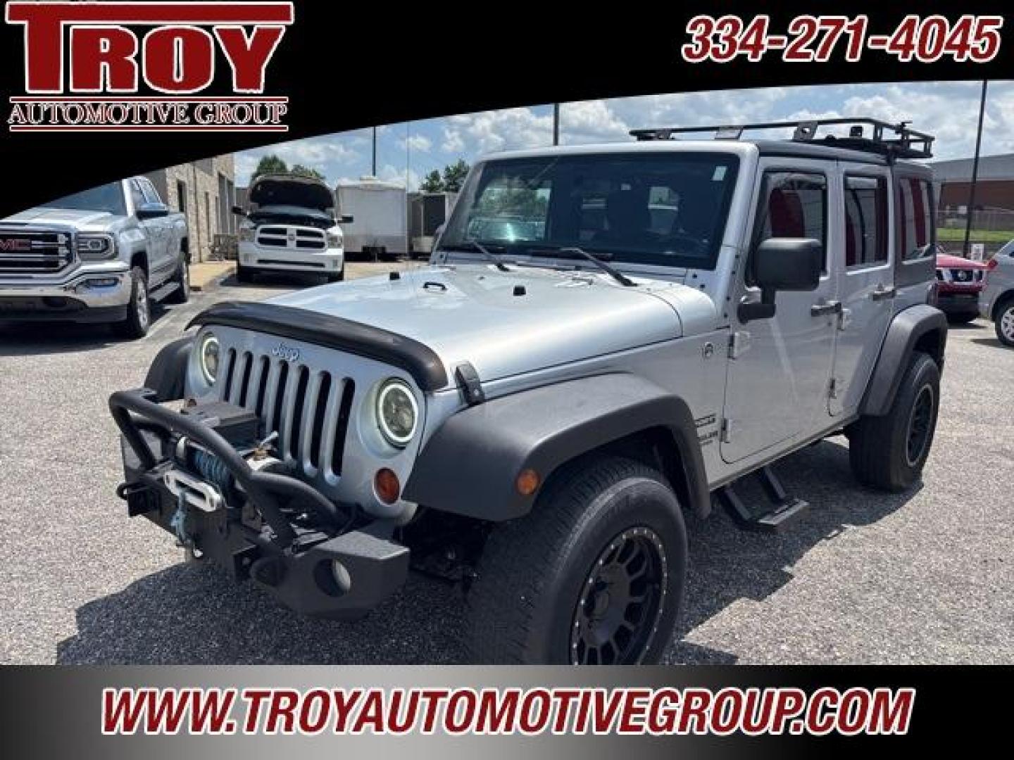 2012 Bright Silver Metallic Clearcoat /Black Interior Jeep Wrangler Unlimited Sport (1C4BJWDG9CL) with an 3.6L V6 24V VVT engine, Automatic transmission, located at 6812 Atlanta Hwy, Montgomery, AL, 36117, (334) 271-4045, 32.382118, -86.178673 - Winch!!<br>Tow Package!!<br>2-Master Remote Keys!!<br>Full Size Matching Spare!!<br>All Power Options!! - Photo#3