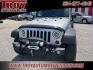 2012 Bright Silver Metallic Clearcoat /Black Interior Jeep Wrangler Unlimited Sport (1C4BJWDG9CL) with an 3.6L V6 24V VVT engine, Automatic transmission, located at 6812 Atlanta Hwy, Montgomery, AL, 36117, (334) 271-4045, 32.382118, -86.178673 - Winch!!<br>Tow Package!!<br>2-Master Remote Keys!!<br>Full Size Matching Spare!!<br>All Power Options!! - Photo#4