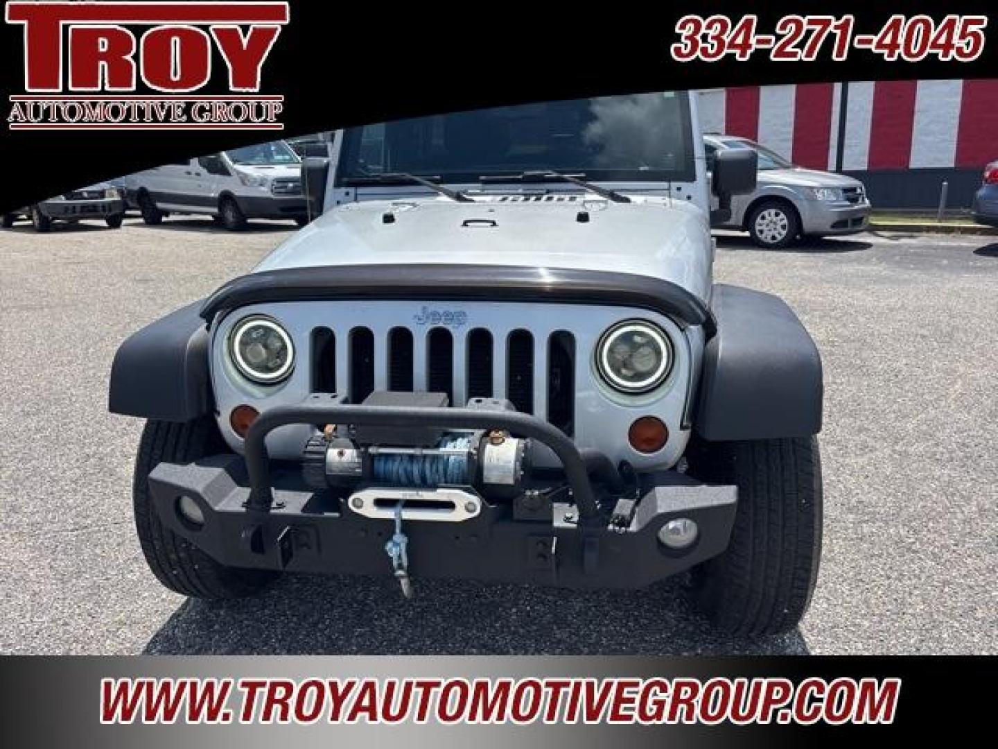 2012 Bright Silver Metallic Clearcoat /Black Interior Jeep Wrangler Unlimited Sport (1C4BJWDG9CL) with an 3.6L V6 24V VVT engine, Automatic transmission, located at 6812 Atlanta Hwy, Montgomery, AL, 36117, (334) 271-4045, 32.382118, -86.178673 - Winch!!<br>Tow Package!!<br>2-Master Remote Keys!!<br>Full Size Matching Spare!!<br>All Power Options!! - Photo#5