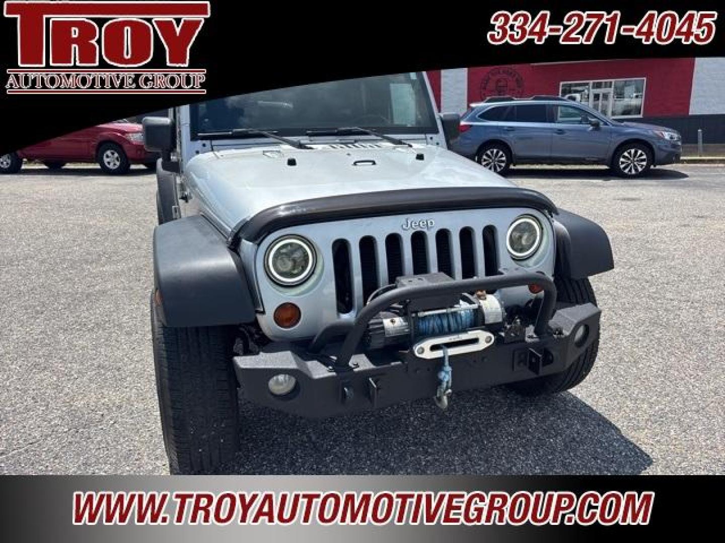 2012 Bright Silver Metallic Clearcoat /Black Interior Jeep Wrangler Unlimited Sport (1C4BJWDG9CL) with an 3.6L V6 24V VVT engine, Automatic transmission, located at 6812 Atlanta Hwy, Montgomery, AL, 36117, (334) 271-4045, 32.382118, -86.178673 - Winch!!<br>Tow Package!!<br>2-Master Remote Keys!!<br>Full Size Matching Spare!!<br>All Power Options!! - Photo#6