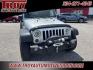 2012 Bright Silver Metallic Clearcoat /Black Interior Jeep Wrangler Unlimited Sport (1C4BJWDG9CL) with an 3.6L V6 24V VVT engine, Automatic transmission, located at 6812 Atlanta Hwy, Montgomery, AL, 36117, (334) 271-4045, 32.382118, -86.178673 - Winch!!<br>Tow Package!!<br>2-Master Remote Keys!!<br>Full Size Matching Spare!!<br>All Power Options!! - Photo#6