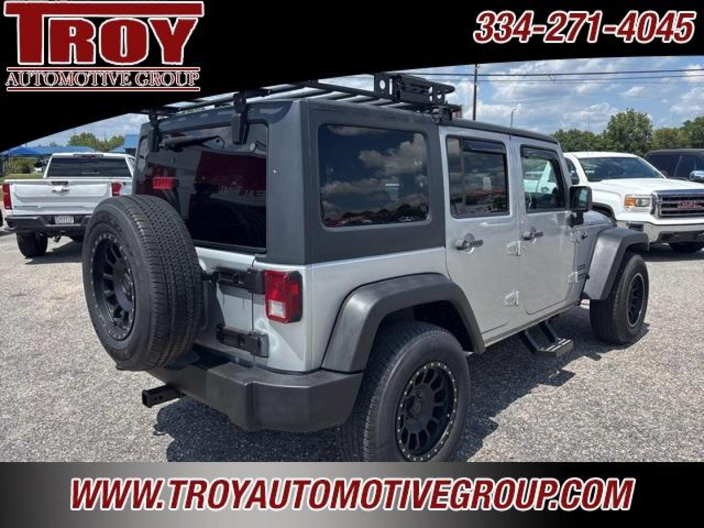 2012 Bright Silver Metallic Clearcoat /Black Interior Jeep Wrangler Unlimited Sport (1C4BJWDG9CL) with an 3.6L V6 24V VVT engine, Automatic transmission, located at 6812 Atlanta Hwy, Montgomery, AL, 36117, (334) 271-4045, 32.382118, -86.178673 - Winch!!<br>Tow Package!!<br>2-Master Remote Keys!!<br>Full Size Matching Spare!!<br>All Power Options!! - Photo#12