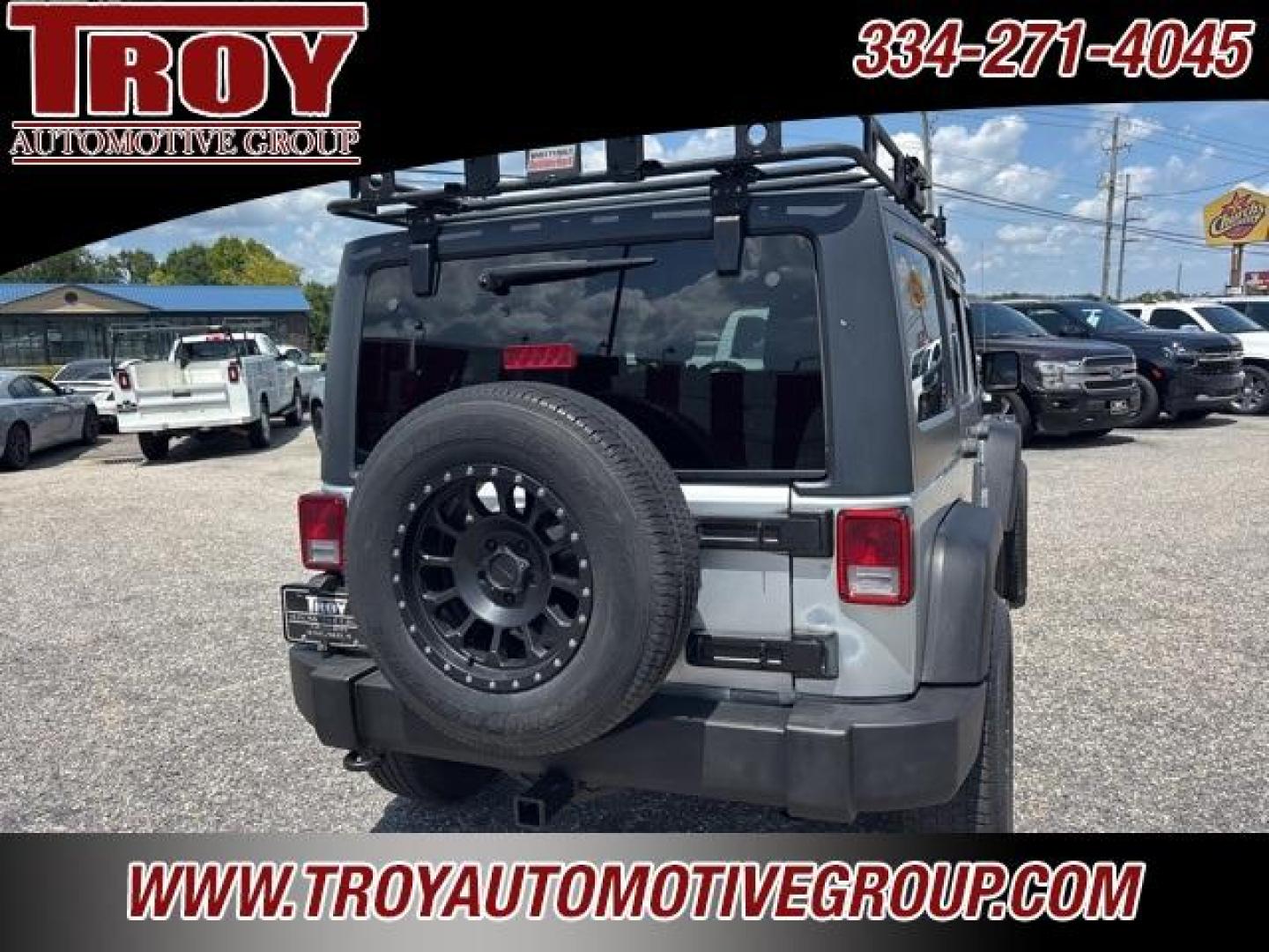 2012 Bright Silver Metallic Clearcoat /Black Interior Jeep Wrangler Unlimited Sport (1C4BJWDG9CL) with an 3.6L V6 24V VVT engine, Automatic transmission, located at 6812 Atlanta Hwy, Montgomery, AL, 36117, (334) 271-4045, 32.382118, -86.178673 - Winch!!<br>Tow Package!!<br>2-Master Remote Keys!!<br>Full Size Matching Spare!!<br>All Power Options!! - Photo#13