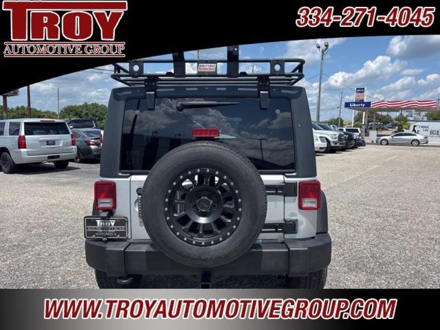 2012 Bright Silver Metallic Clearcoat /Black Interior Jeep Wrangler Unlimited Sport (1C4BJWDG9CL) with an 3.6L V6 24V VVT engine, Automatic transmission, located at 6812 Atlanta Hwy, Montgomery, AL, 36117, (334) 271-4045, 32.382118, -86.178673 - Winch!!<br>Tow Package!!<br>2-Master Remote Keys!!<br>Full Size Matching Spare!!<br>All Power Options!! - Photo#14