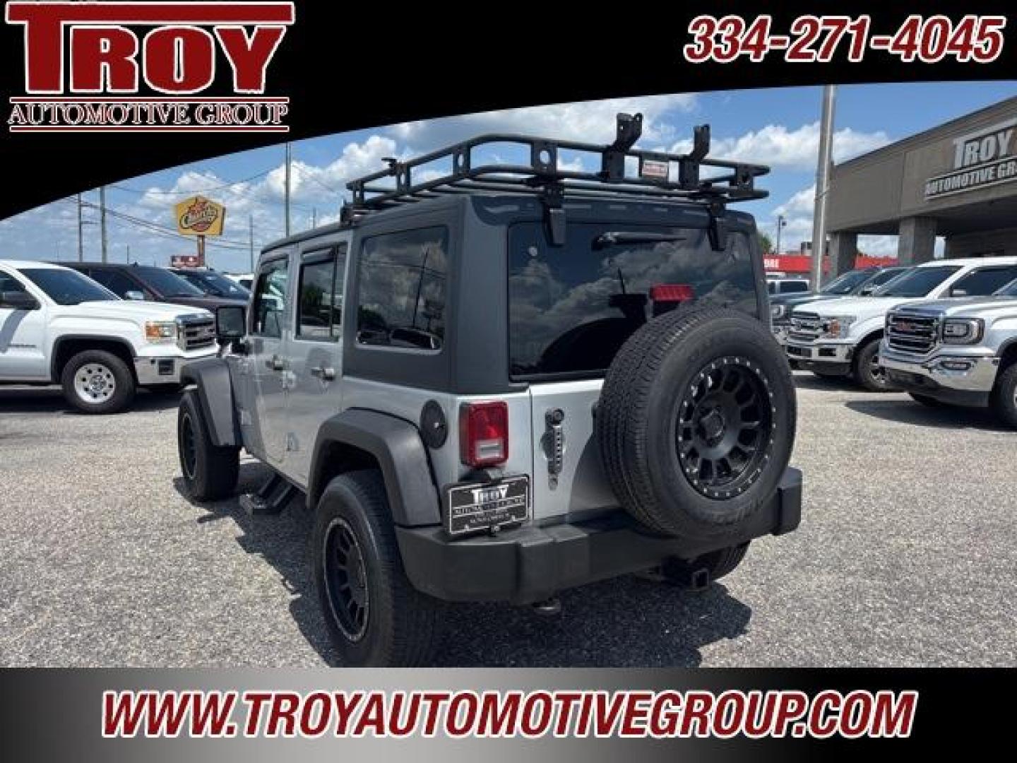 2012 Bright Silver Metallic Clearcoat /Black Interior Jeep Wrangler Unlimited Sport (1C4BJWDG9CL) with an 3.6L V6 24V VVT engine, Automatic transmission, located at 6812 Atlanta Hwy, Montgomery, AL, 36117, (334) 271-4045, 32.382118, -86.178673 - Winch!!<br>Tow Package!!<br>2-Master Remote Keys!!<br>Full Size Matching Spare!!<br>All Power Options!! - Photo#15