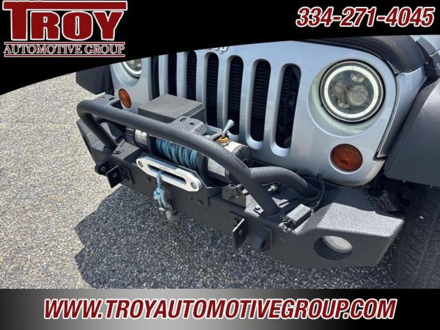 2012 Bright Silver Metallic Clearcoat /Black Interior Jeep Wrangler Unlimited Sport (1C4BJWDG9CL) with an 3.6L V6 24V VVT engine, Automatic transmission, located at 6812 Atlanta Hwy, Montgomery, AL, 36117, (334) 271-4045, 32.382118, -86.178673 - Winch!!<br>Tow Package!!<br>2-Master Remote Keys!!<br>Full Size Matching Spare!!<br>All Power Options!! - Photo#21