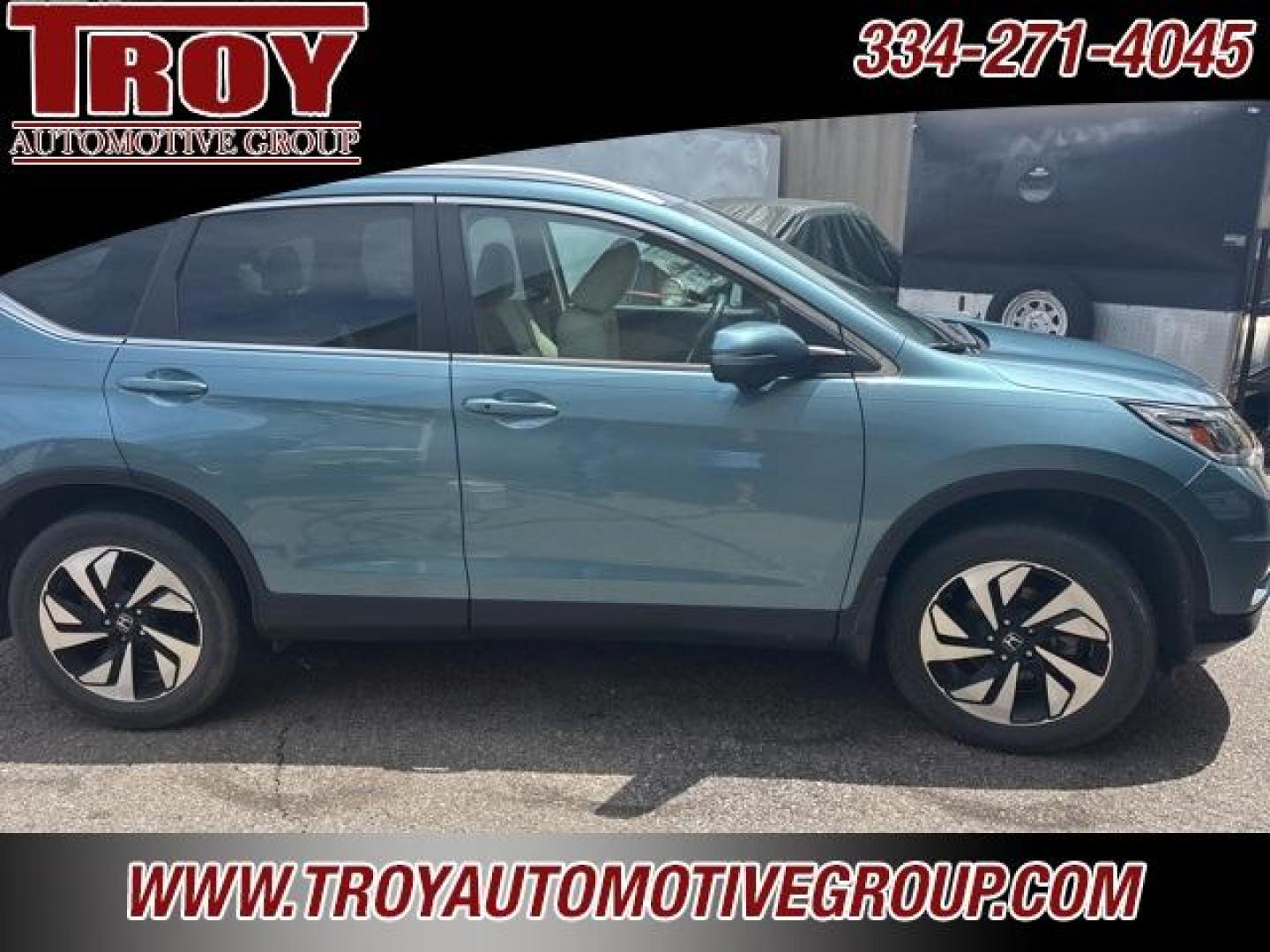 2016 Obsidian Blue Pearl /Beige Honda CR-V Touring (5J6RM4H96GL) with an 2.4L I4 DOHC 16V i-VTEC engine, CVT transmission, located at 6812 Atlanta Hwy, Montgomery, AL, 36117, (334) 271-4045, 32.382118, -86.178673 - Priced below KBB Fair Purchase Price!<br><br>Obsidian Blue Pearl 2016 Honda CR-V Touring AWD 2.4L I4 DOHC 16V i-VTEC CVT<br><br>Financing Available---Top Value for Trades.<br><br>25/31 City/Highway MPG<br><br><br>Awards:<br> * 2016 IIHS Top Safety Pick+ (With Touring Model) * 2016 KBB.com Brand I - Photo#0