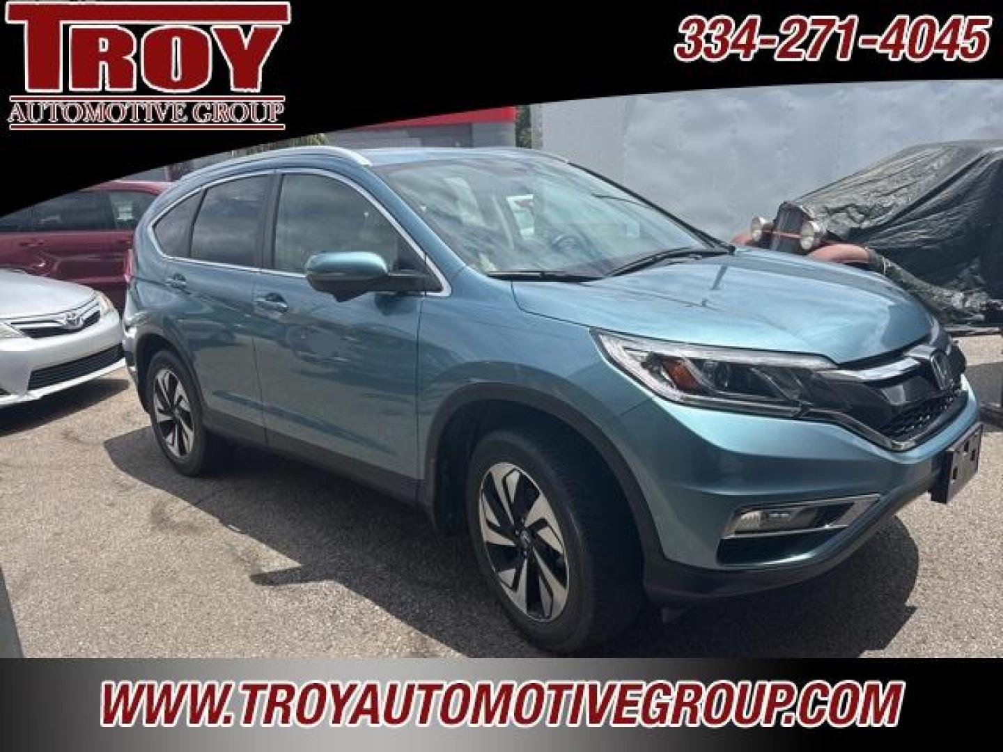 2016 Obsidian Blue Pearl /Beige Honda CR-V Touring (5J6RM4H96GL) with an 2.4L I4 DOHC 16V i-VTEC engine, CVT transmission, located at 6812 Atlanta Hwy, Montgomery, AL, 36117, (334) 271-4045, 32.382118, -86.178673 - Priced below KBB Fair Purchase Price!<br><br>Obsidian Blue Pearl 2016 Honda CR-V Touring AWD 2.4L I4 DOHC 16V i-VTEC CVT<br><br>Financing Available---Top Value for Trades.<br><br>25/31 City/Highway MPG<br><br><br>Awards:<br> * 2016 IIHS Top Safety Pick+ (With Touring Model) * 2016 KBB.com Brand I - Photo#1
