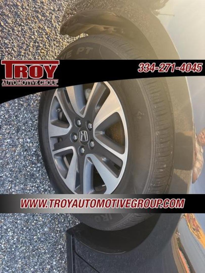 2016 Crystal Black Pearl /Gray Honda Odyssey (5FNRL5H92GB) with an 3.5L V6 SOHC i-VTEC 24V engine, Automatic transmission, located at 6812 Atlanta Hwy, Montgomery, AL, 36117, (334) 271-4045, 32.382118, -86.178673 - Priced below KBB Fair Purchase Price!<br><br>Crystal Black Pearl 2016 Honda Odyssey FWD 3.5L V6 SOHC i-VTEC 24V 6-Speed Automatic<br><br>Financing Available---Top Value for Trades.<br><br>19/28 City/Highway MPG<br><br><br>Awards:<br> * 2016 KBB.com Best Buy Awards * 2016 KBB.com Best Buy Awards F - Photo#9