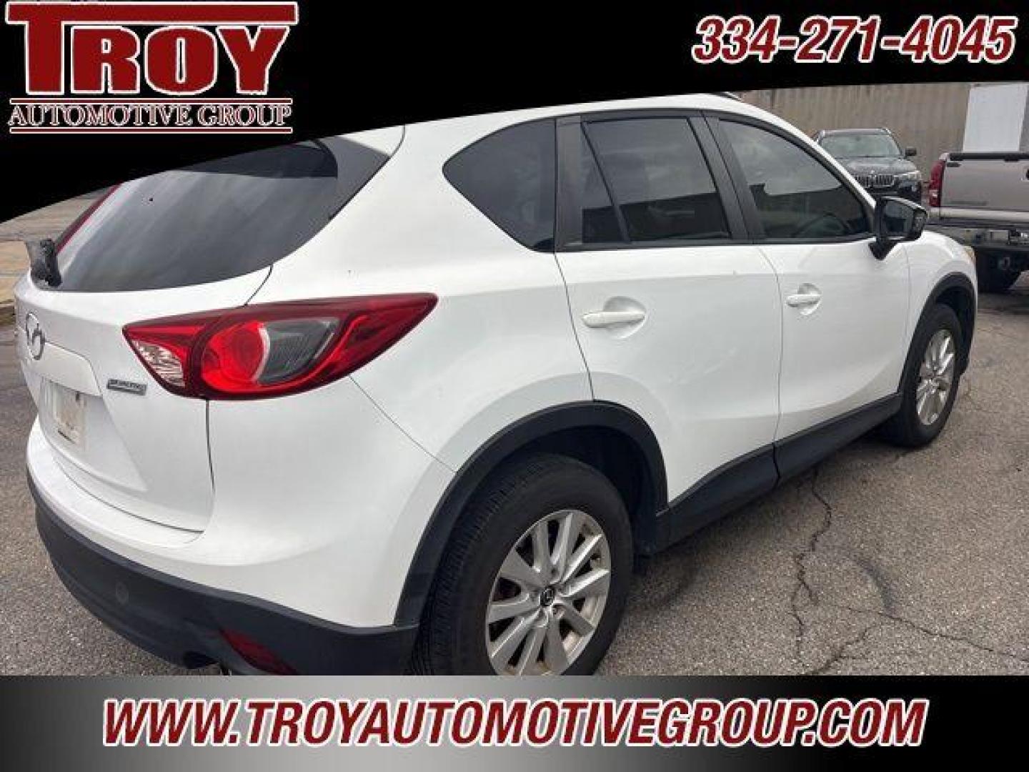 2013 Crystal White Pearl /Black Mazda CX-5 Touring (JM3KE2CE8D0) with an SKYACTIV-G 2.0L 4-Cylinder DOHC 16V engine, Automatic transmission, located at 6812 Atlanta Hwy, Montgomery, AL, 36117, (334) 271-4045, 32.382118, -86.178673 - Heated Leather Seats!!<br>Power Driver Seat!!<br>2 -Master Remote Entry Keys!!<br> - Photo#4