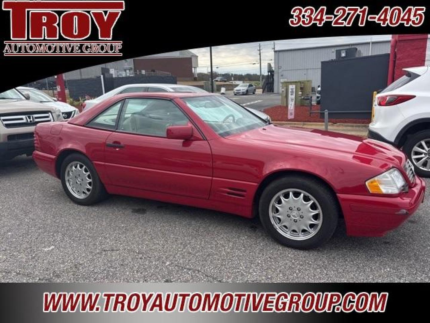 1997 Red /Parchment Mercedes-Benz SL-Class SL 320 (WDBFA63FXVF) with an 3.2L I6 engine, Automatic transmission, located at 6812 Atlanta Hwy, Montgomery, AL, 36117, (334) 271-4045, 32.382118, -86.178673 - Recent Arrival!<br>Hard Top!!<br>Hard Top Stand!!<br>Black Soft Top!!<br><br>Red 1997 Mercedes-Benz SL-Class SL 320 RWD 3.2L I6 5-Speed Automatic<br><br>Financing Available---Top Value for Trades - Photo#1