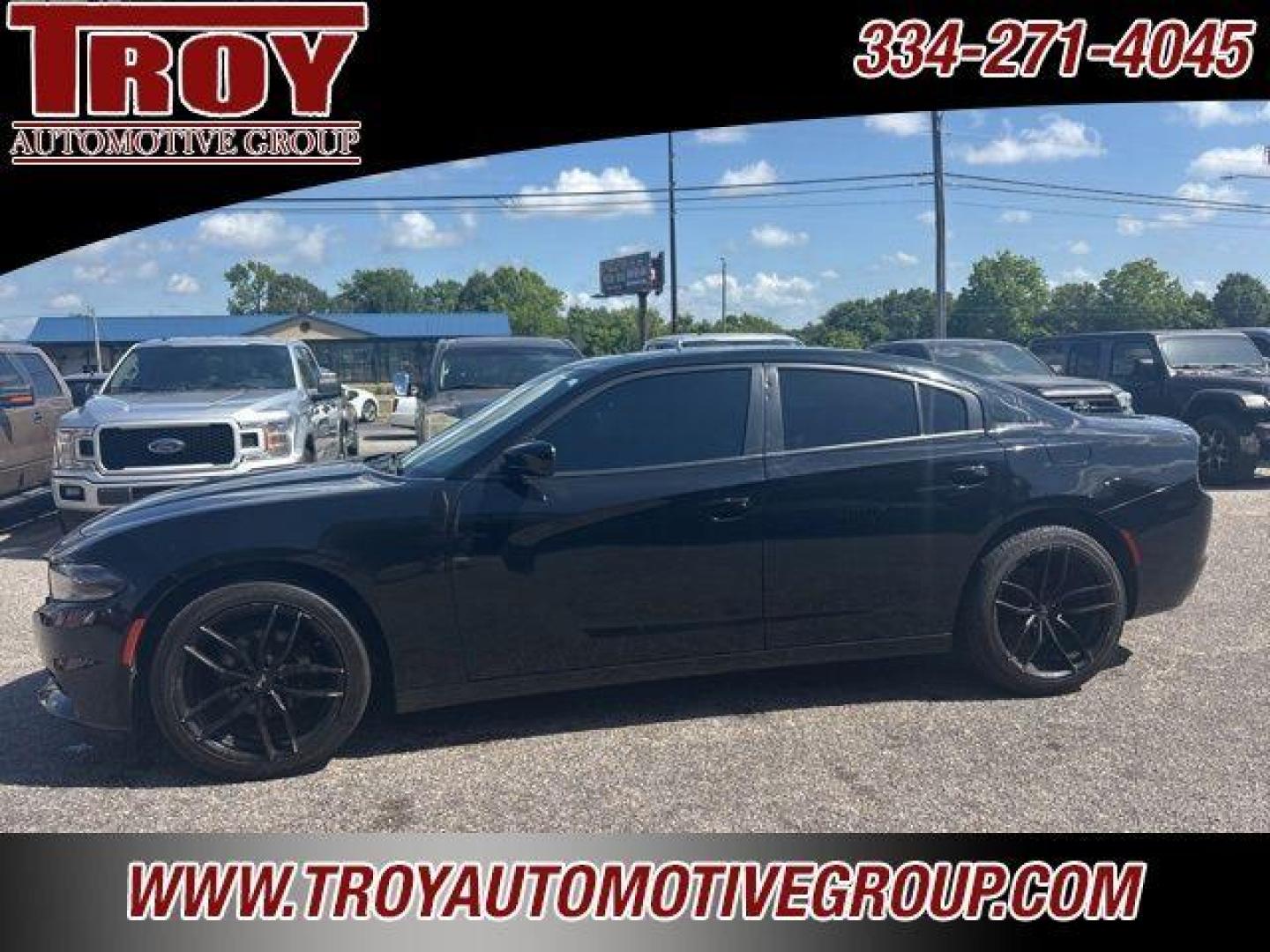 2019 Pitch Black Clearcoat /Black Dodge Charger SXT (2C3CDXBG8KH) with an 3.6L 6-Cylinder SMPI DOHC engine, Automatic transmission, located at 6812 Atlanta Hwy, Montgomery, AL, 36117, (334) 271-4045, 32.382118, -86.178673 - Pitch Black Clearcoat 2019 Dodge Charger SXT RWD 3.6L 6-Cylinder SMPI DOHC 8-Speed Automatic<br><br>Financing Available---Top Value for Trades.<br><br>19/30 City/Highway MPG<br><br><br>Awards:<br> * 2019 KBB.com Brand Image Awards * 2019 KBB.com Best Resale Value Awards - Photo#0