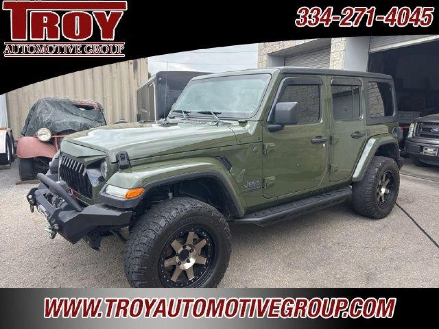 2021 Sarge Green Clearcoat /Black Jeep Wrangler (1C4HJXDN9MW) with an 2.0L I4 DOHC engine, Automatic transmission, located at 6812 Atlanta Hwy, Montgomery, AL, 36117, (334) 271-4045, 32.382118, -86.178673 - Recent Arrival!<br>80 th Special Edition!!<br>Tow Package!!<br>Step Bars!!<br>Winch!!<br>Rough Country Lift!!<br>Sarge Green Clearcoat 2021 Jeep Wrangler 4WD 2.0L I4 DOHC 8-Speed Automatic<br><br>Financing Available---Top Value for Trades.o - Photo#1