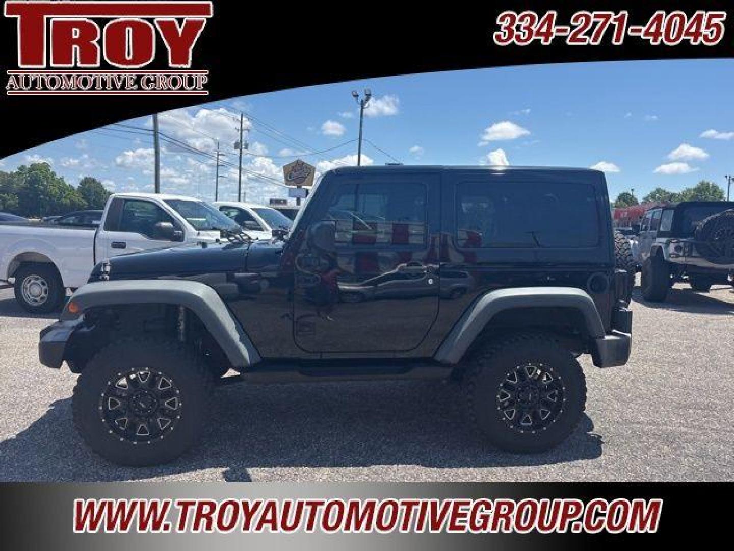 2017 Black Clearcoat /Black Jeep Wrangler Sport (1C4AJWAG0HL) with an 3.6L V6 24V VVT engine, Automatic transmission, located at 6812 Atlanta Hwy, Montgomery, AL, 36117, (334) 271-4045, 32.382118, -86.178673 - Painted to match hardtop!!<br>Power Windows/Locks!!<br>Full Matching Spare!!<br>2-Master Keys!!<br>Alpine factory premium stereo!!<br>Prp premium seat covers!!<br>2 Fox Lift Kit!!<br> - Photo#0