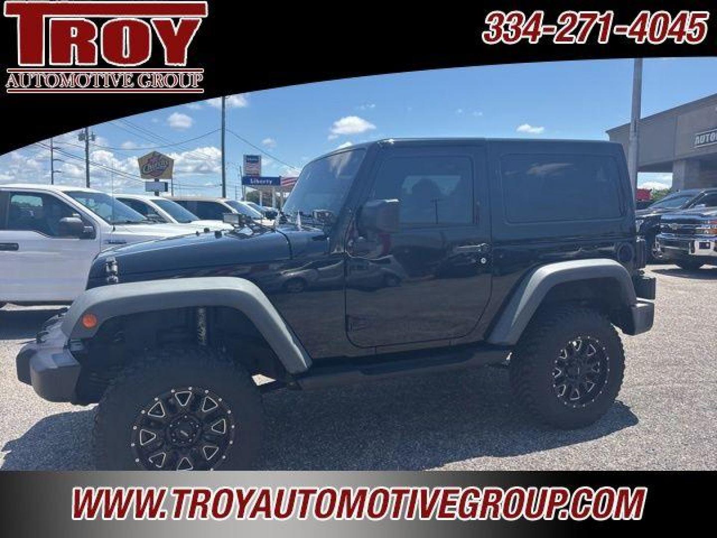 2017 Black Clearcoat /Black Jeep Wrangler Sport (1C4AJWAG0HL) with an 3.6L V6 24V VVT engine, Automatic transmission, located at 6812 Atlanta Hwy, Montgomery, AL, 36117, (334) 271-4045, 32.382118, -86.178673 - Painted to match hardtop!!<br>Power Windows/Locks!!<br>Full Matching Spare!!<br>2-Master Keys!!<br>Alpine factory premium stereo!!<br>Prp premium seat covers!!<br>2 Fox Lift Kit!!<br> - Photo#2