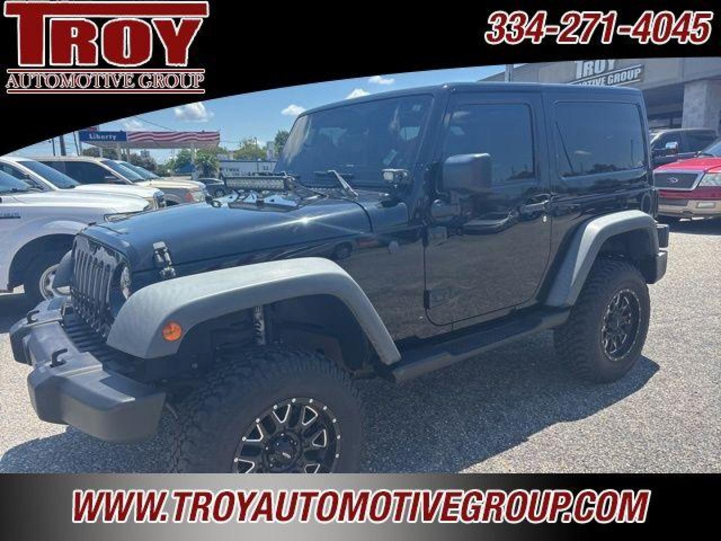 2017 Black Clearcoat /Black Jeep Wrangler Sport (1C4AJWAG0HL) with an 3.6L V6 24V VVT engine, Automatic transmission, located at 6812 Atlanta Hwy, Montgomery, AL, 36117, (334) 271-4045, 32.382118, -86.178673 - Painted to match hardtop!!<br>Power Windows/Locks!!<br>Full Matching Spare!!<br>2-Master Keys!!<br>Alpine factory premium stereo!!<br>Prp premium seat covers!!<br>2 Fox Lift Kit!!<br> - Photo#3