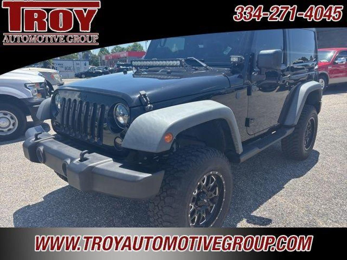 2017 Black Clearcoat /Black Jeep Wrangler Sport (1C4AJWAG0HL) with an 3.6L V6 24V VVT engine, Automatic transmission, located at 6812 Atlanta Hwy, Montgomery, AL, 36117, (334) 271-4045, 32.382118, -86.178673 - Painted to match hardtop!!<br>Power Windows/Locks!!<br>Full Matching Spare!!<br>2-Master Keys!!<br>Alpine factory premium stereo!!<br>Prp premium seat covers!!<br>2 Fox Lift Kit!!<br> - Photo#4