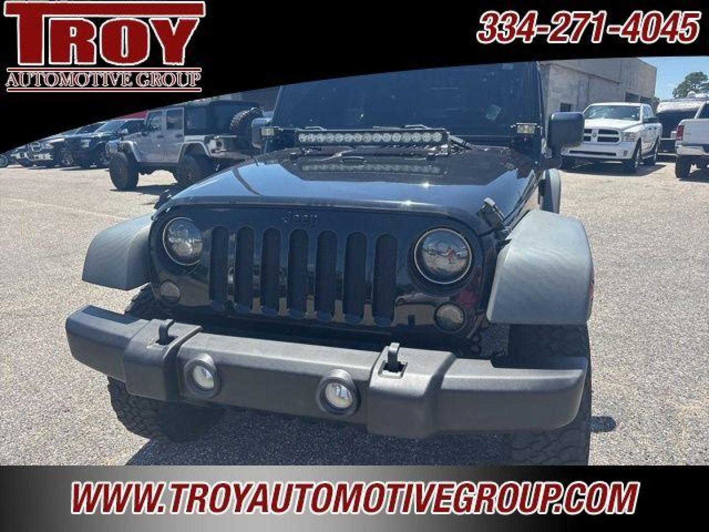 2017 Black Clearcoat /Black Jeep Wrangler Sport (1C4AJWAG0HL) with an 3.6L V6 24V VVT engine, Automatic transmission, located at 6812 Atlanta Hwy, Montgomery, AL, 36117, (334) 271-4045, 32.382118, -86.178673 - Painted to match hardtop!!<br>Power Windows/Locks!!<br>Full Matching Spare!!<br>2-Master Keys!!<br>Alpine factory premium stereo!!<br>Prp premium seat covers!!<br>2 Fox Lift Kit!!<br> - Photo#5