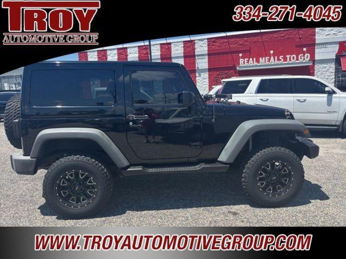 2017 Black Clearcoat /Black Jeep Wrangler Sport (1C4AJWAG0HL) with an 3.6L V6 24V VVT engine, Automatic transmission, located at 6812 Atlanta Hwy, Montgomery, AL, 36117, (334) 271-4045, 32.382118, -86.178673 - Painted to match hardtop!!<br>Power Windows/Locks!!<br>Full Matching Spare!!<br>2-Master Keys!!<br>Alpine factory premium stereo!!<br>Prp premium seat covers!!<br>2 Fox Lift Kit!!<br> - Photo#8