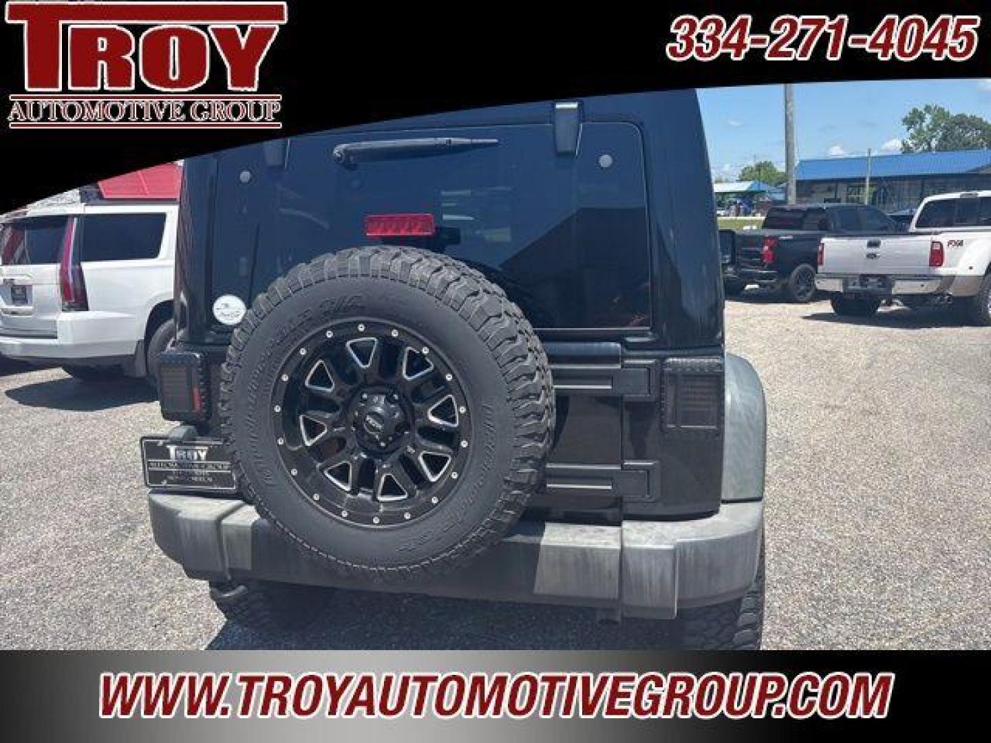 2017 Black Clearcoat /Black Jeep Wrangler Sport (1C4AJWAG0HL) with an 3.6L V6 24V VVT engine, Automatic transmission, located at 6812 Atlanta Hwy, Montgomery, AL, 36117, (334) 271-4045, 32.382118, -86.178673 - Painted to match hardtop!!<br>Power Windows/Locks!!<br>Full Matching Spare!!<br>2-Master Keys!!<br>Alpine factory premium stereo!!<br>Prp premium seat covers!!<br>2 Fox Lift Kit!!<br> - Photo#11