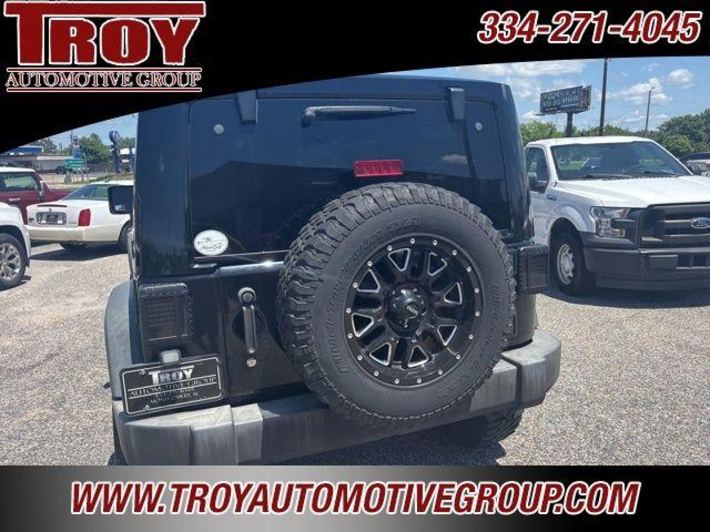 2017 Black Clearcoat /Black Jeep Wrangler Sport (1C4AJWAG0HL) with an 3.6L V6 24V VVT engine, Automatic transmission, located at 6812 Atlanta Hwy, Montgomery, AL, 36117, (334) 271-4045, 32.382118, -86.178673 - Painted to match hardtop!!<br>Power Windows/Locks!!<br>Full Matching Spare!!<br>2-Master Keys!!<br>Alpine factory premium stereo!!<br>Prp premium seat covers!!<br>2 Fox Lift Kit!!<br> - Photo#12